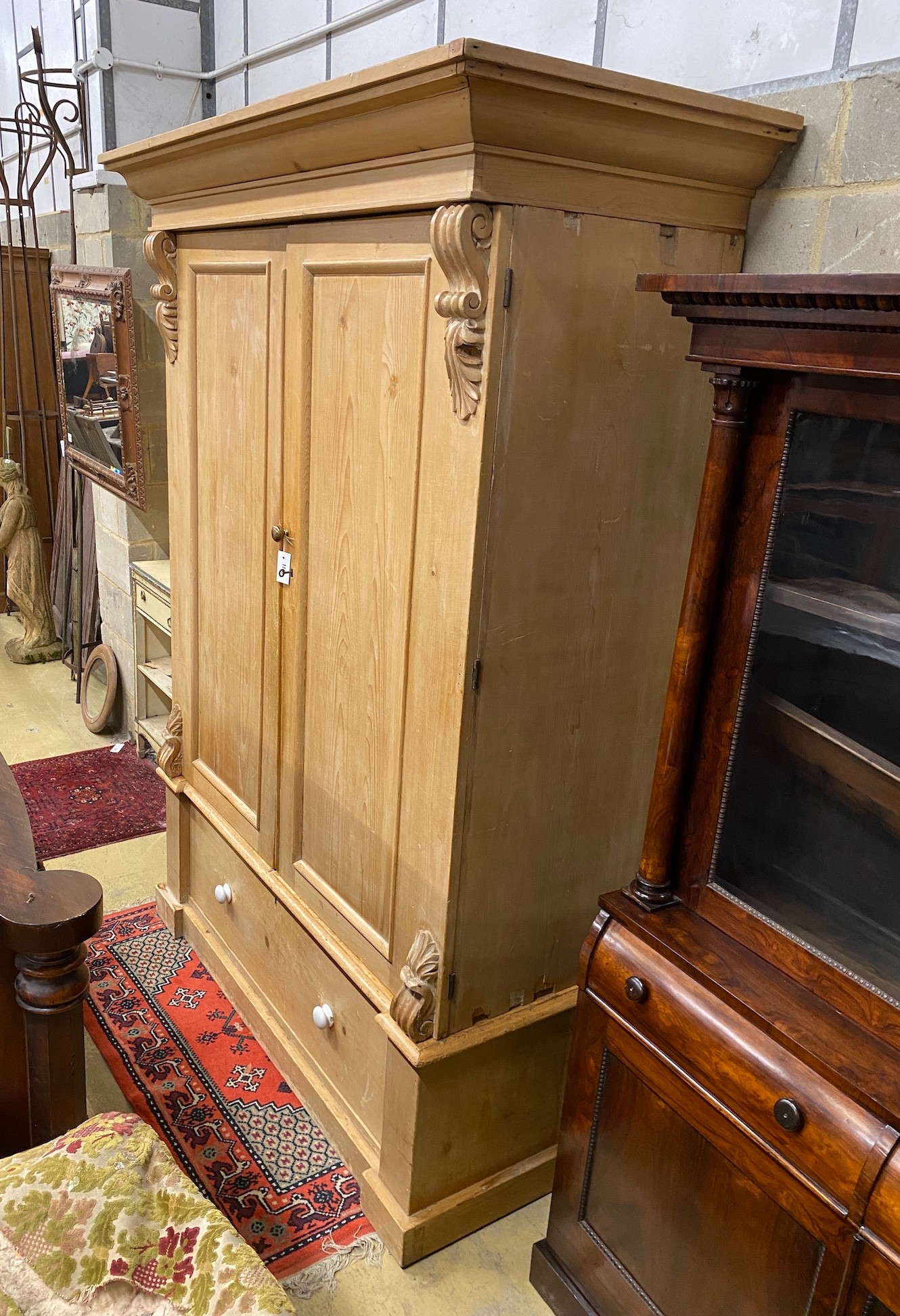 An Edwardian pine wardrobe, width 158cm, height 216cm